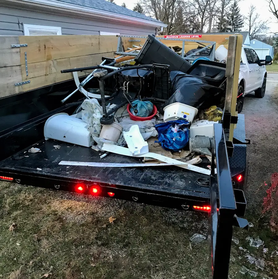 Roll-off dumpster delivered to a residential driveway in Potomac